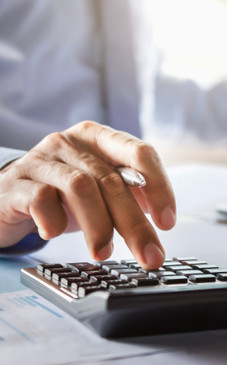 close up of hand typing on a keyboard